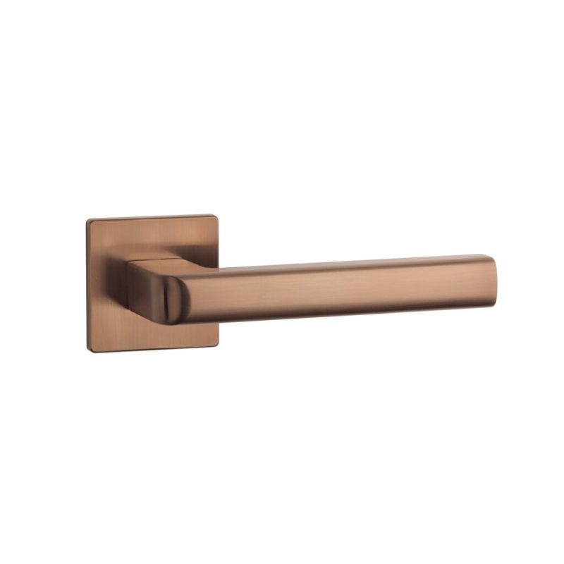 Tev Handles' Salice handle in PVD copper adds a premium touch to modern spaces with its elegant slim square rosette design.